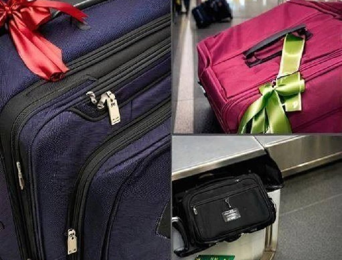 Warum das Binden einer Schleife am Gepäck keine gute Idee ist – Ein Reiseexperte erklärt