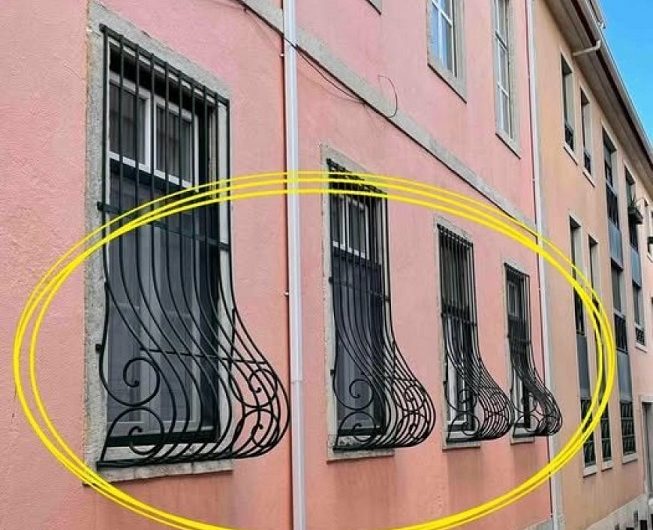 Warum manche Fenstergitter unten eine Rundung haben – eine kleine Alltagsbeobachtung mit erstaunlich viel Geschichte
